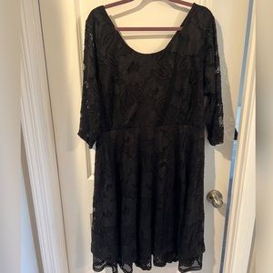 Black lace quarter sleeve fit and flare dress